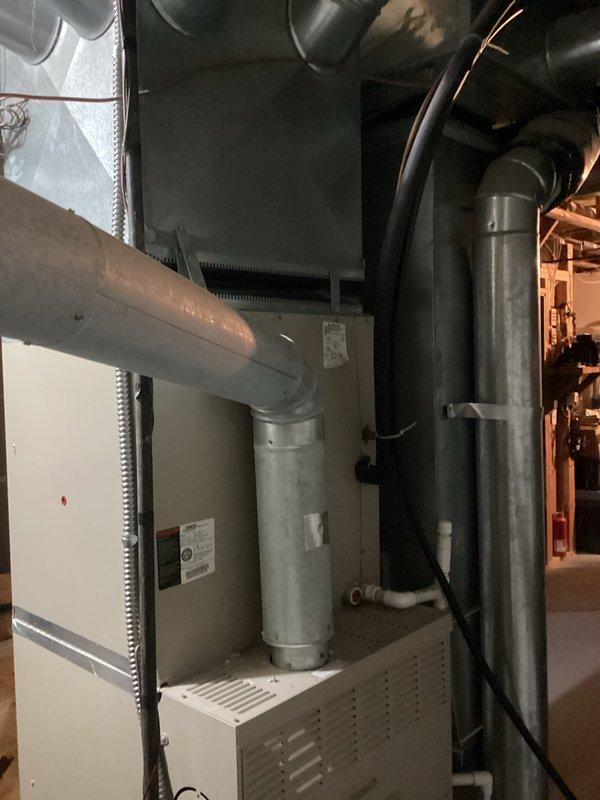 Completed comprehensive HVAC system replacement estimate for aging air conditioning unit experiencing R22 refrigerant loss. Assessed existing equipment in mechanical room, documented current system configuration including air handler, ductwork connections, and refrigerant piping infrastructure to provide accurate replacement specifications for transitioning to modern, environmentally-compliant refrigerant system.