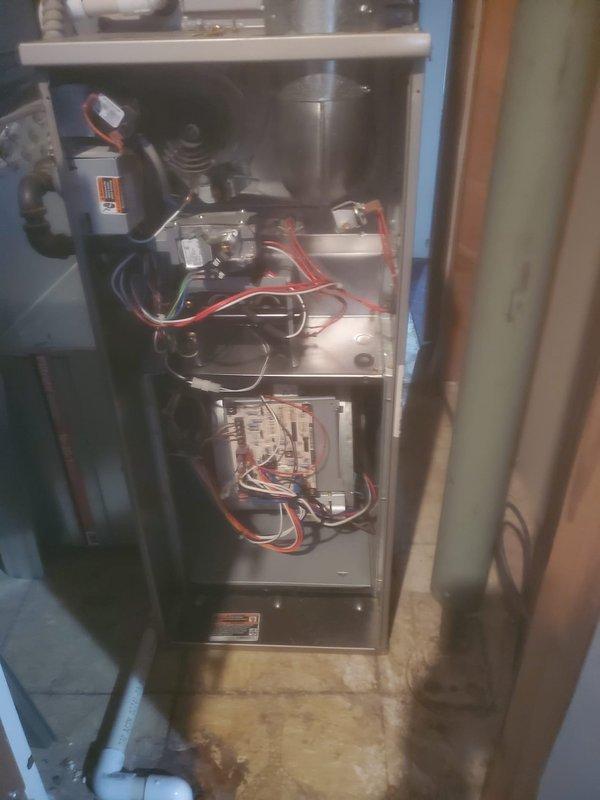 Completed comprehensive seasonal maintenance on residential HVAC system including both furnace and air conditioning units. Performed thorough inspection of furnace internal components including blower motor assembly, gas valve, electrical connections, control boards, and safety devices. Inspected AC compressor unit, refrigerant lines, condensate drain pan, and electrical connections. All components found to be operating within manufacturer specifications with no immediate service needs identified.