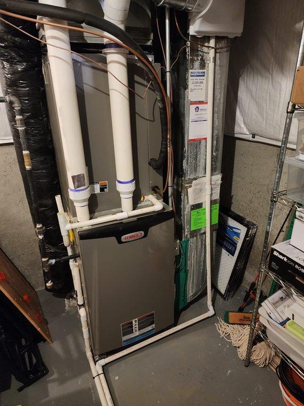Replaced failed blower motor and control module on Lennox furnace system. Performed complete AC and furnace maintenance including comprehensive system inspection, cleaning, and testing of all components. Rebuilt condensate drain line configuration to separate humidifier drain from AC drain line, improving serviceability and preventing future drainage issues. All systems tested and operating within manufacturer specifications upon completion.