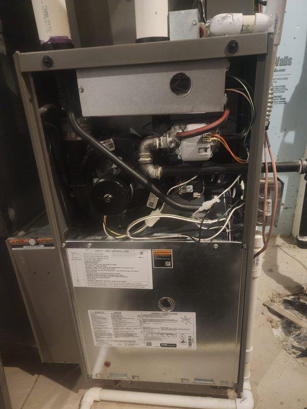 Completed comprehensive preventive maintenance on Lennox Elite furnace and air conditioning system qualifying for consumer and utility rebate program. Performed thorough inspection of all internal components including gas valves, pressure switches, blower motor assembly, electrical connections, and wiring harnesses. Verified proper operation of condensate drainage system with PVC piping. All components found to be in functional condition with no immediate repairs required. System tested and returned to normal operation.