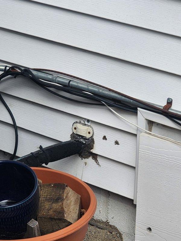 Responded to service call for high electrical bills with heat pump running continuously. Performed system inspection of outdoor heat pump unit and associated electrical components. Documented existing equipment configuration including outdoor condenser unit, electrical disconnect, and backup generator system. Unit accessibility and exterior connections were photographed for service records.