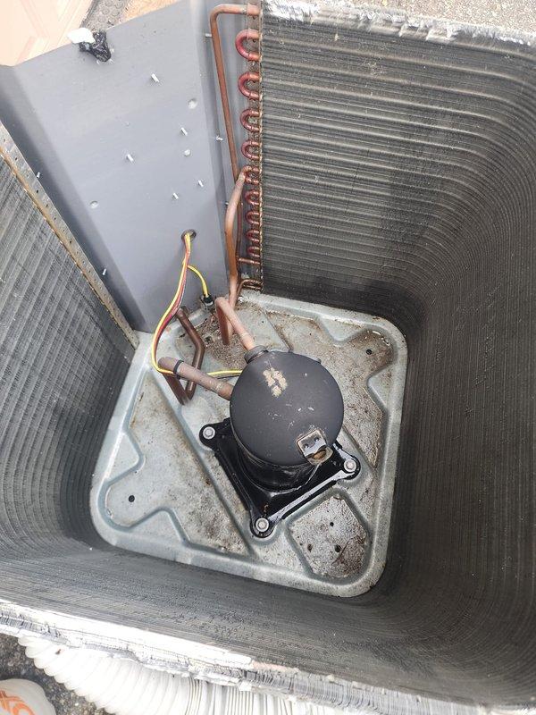 Completed comprehensive preventive maintenance service on a six-year-old outdoor air conditioning condenser unit as part of annual Worry Free Service Agreement. Performed full system inspection including compressor operation, refrigerant lines, electrical connections, and condenser coil condition. All components found operating within normal parameters with no deficiencies noted. Unit properly secured on vibration-dampening pad with appropriate clearances maintained. Documented system condition with photographs for service records.