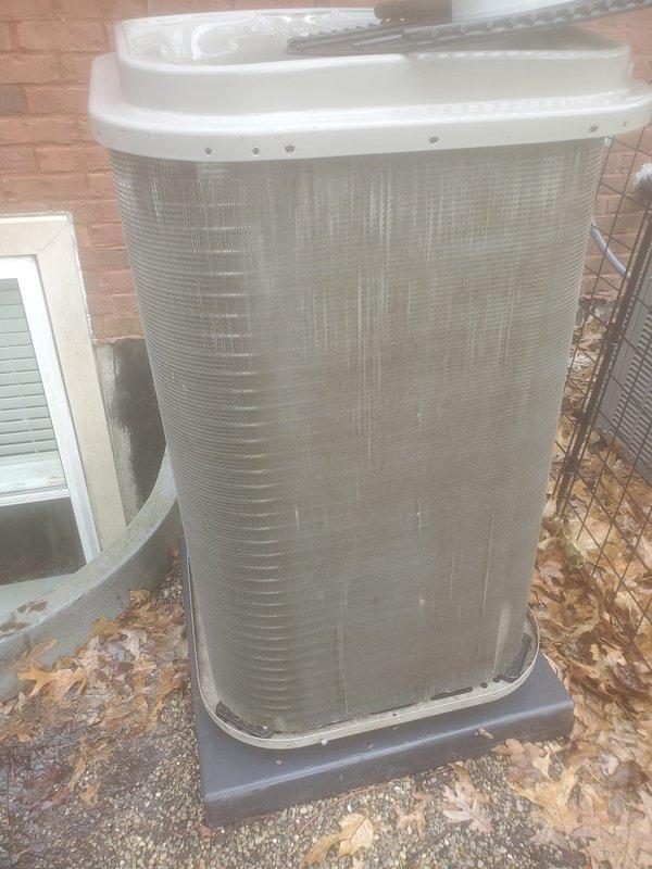 Completed comprehensive AC tune-up on 7-year-old outdoor condenser unit. Performed full system evaluation including inspection of compressor, refrigerant lines, and electrical connections. Assessed unit levelness and stability on base pad as requested due to visible lean against brick wall exterior. Verified protective mesh screening intact and all mechanical components operating within normal parameters. Cleaned condenser coils, checked refrigerant pressures, and confirmed proper airflow through ventilation slots. System tested and running efficiently with no immediate concerns identified.