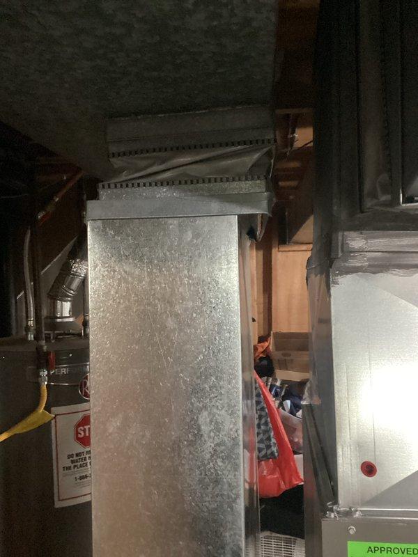 Completed comprehensive HVAC system replacement estimate following identification of failed heat exchanger. Assessed existing furnace unit with compromised heat exchanger presenting safety concerns, documented extensive condensation formation on ductwork indicating potential system inefficiency, and evaluated water heater installation in mechanical room. Provided detailed replacement options under quote numbers 03999-04 and 03999-02 for complete system upgrade to ensure safe and efficient heating operation.
