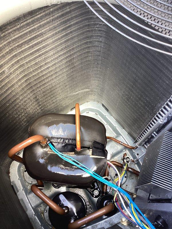 Completed comprehensive heating maintenance inspection on residential multi-zone HVAC system including outdoor condenser unit and mini-split components. Performed thorough visual inspection of internal compressor assembly, verified refrigerant line connections, examined electrical wiring and disconnect box, and documented system condition with all components operating within normal parameters.