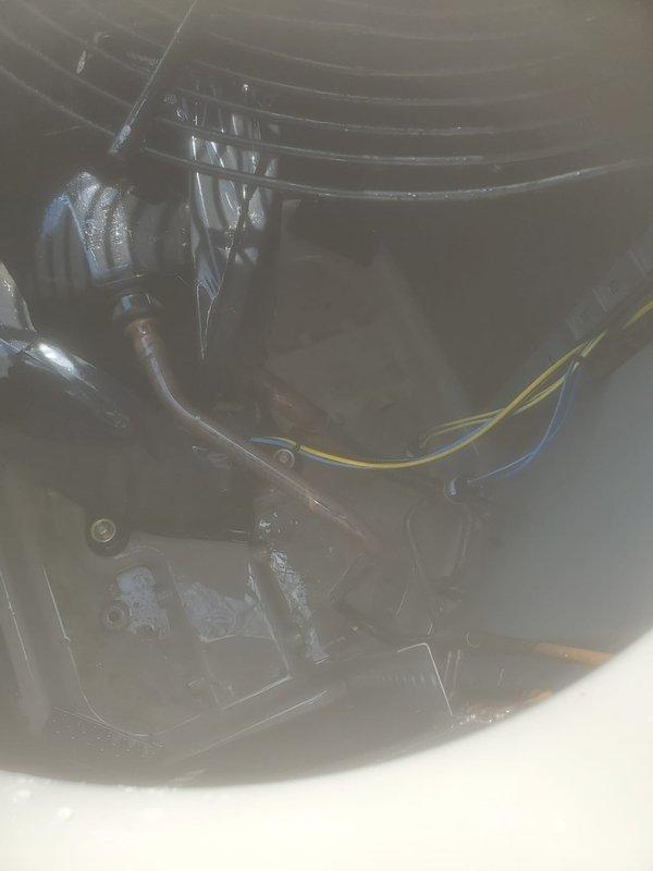 Completed routine maintenance on a 6-year-old residential air conditioning system. Performed comprehensive tune-up including inspection of outdoor condensing unit, fan assembly, and motor compartment. Verified proper operation of condenser fan with protective grille, checked refrigerant line insulation integrity, and inspected electrical connections including control wiring. Cleaned unit components, examined blower assembly, and confirmed system is operating within manufacturer specifications for the cooling season.