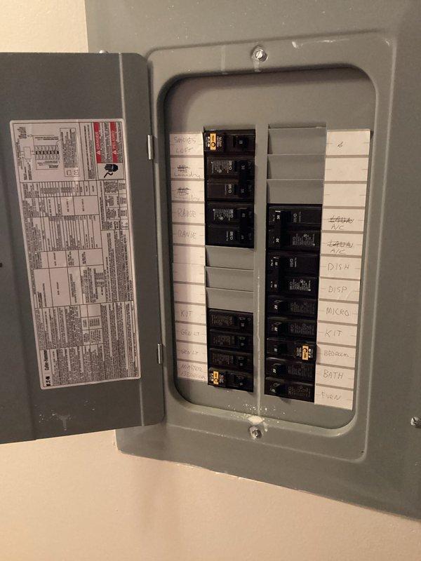 Conducted on-site evaluation for replacement of non-operational air conditioning unit over 20 years old located near front entrance of rental property. Assessed existing electrical infrastructure including main breaker panel to determine compatibility requirements for new equipment installation. Provided comprehensive replacement estimate to address failed cooling system, documenting current conditions and electrical service capacity for proposed HVAC equipment upgrade.