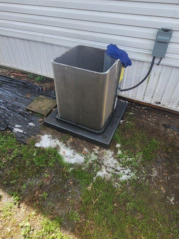 Completed scheduled air conditioning maintenance on residential cooling system. Performed comprehensive inspection of outdoor condensing unit, including examination of refrigerant lines, compressor components, and electrical connections. Unit found in operational condition with normal weathering present on copper piping. All system components verified for proper function and seasonal readiness.