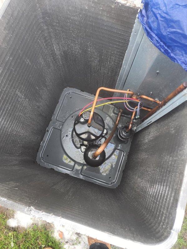 Completed scheduled air conditioning maintenance on residential cooling system. Performed comprehensive inspection of outdoor condensing unit, including examination of refrigerant lines, compressor components, and electrical connections. Unit found in operational condition with normal weathering present on copper piping. All system components verified for proper function and seasonal readiness.