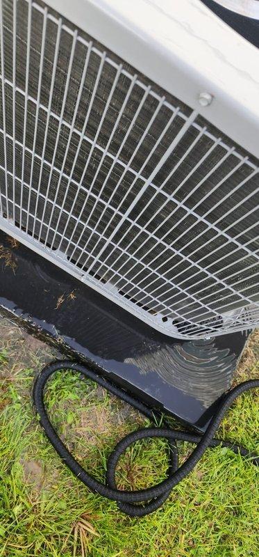 Completed routine air conditioning maintenance on outdoor condensing unit. Performed comprehensive system inspection including examination of condenser coils, refrigerant lines, fan assembly, and electrical components. Unit exterior and interior components were assessed for proper operation, with copper refrigerant lines and electrical junction box verified to be in satisfactory condition. Condensate drainage system and pan inspected and confirmed functioning properly.