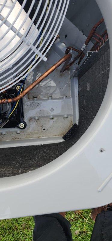 Completed routine air conditioning maintenance on outdoor condensing unit. Performed comprehensive system inspection including examination of condenser coils, refrigerant lines, fan assembly, and electrical components. Unit exterior and interior components were assessed for proper operation, with copper refrigerant lines and electrical junction box verified to be in satisfactory condition. Condensate drainage system and pan inspected and confirmed functioning properly.