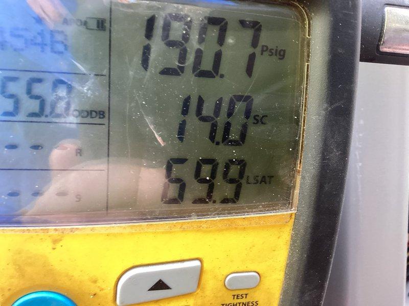 Performed complimentary seasonal air conditioner start-up and system diagnostics. Measured system pressures at 190.7 PSIG with 148°F superheat/subcool reading and 59.9°F saturation temperature using digital gauges. Verified thermostat operation displaying 68°F setpoint with proper communication to system.