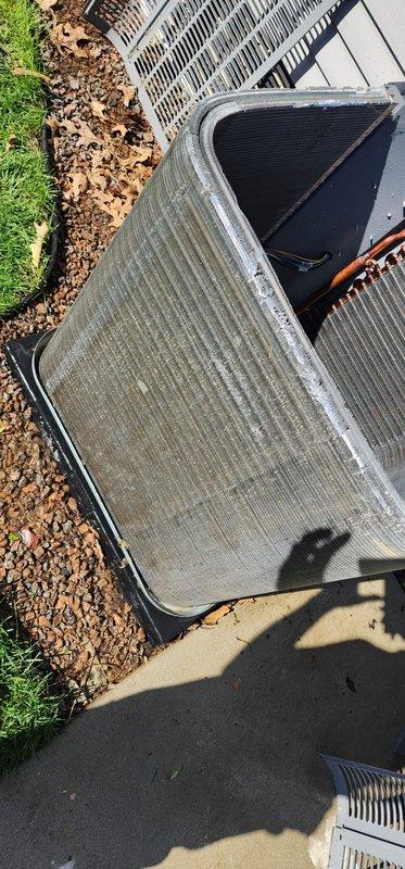 Completed scheduled A/C maintenance on residential outdoor condensing unit. Performed standard preventive maintenance inspection of system components including condenser coil, fan assembly, and protective housing. Unit operating properly with no deficiencies noted during service visit.