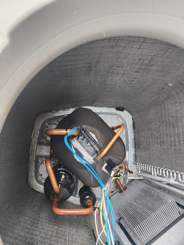 Completed scheduled maintenance on residential air conditioning system. Inspected outdoor condenser unit and noted moderate dust and debris accumulation on coil fins. Accessed indoor air handler components through service opening to verify proper operation of blower motor, electrical connections, and refrigerant lines. All wiring connections, capacitor, and control board showed normal condition. System operational upon completion of maintenance inspection.