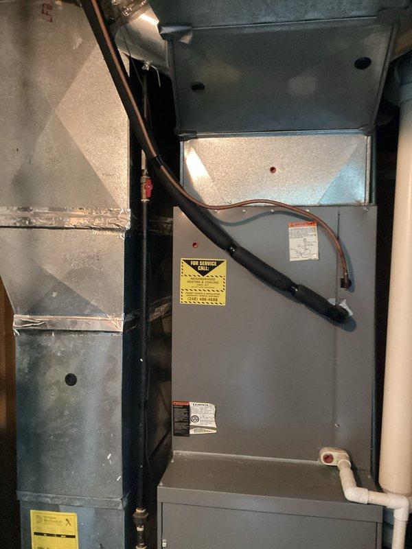 Conducted estimate for replacement of existing HVAC system due to low R-22 refrigerant levels in aging air conditioning unit. Assessed current air handler installation in mechanical space and documented equipment condition, noting the system's reliance on phased-out R-22 refrigerant which makes ongoing repairs increasingly cost-prohibitive. Provided replacement options for complete system upgrade to modern, environmentally-friendly refrigerant technology.