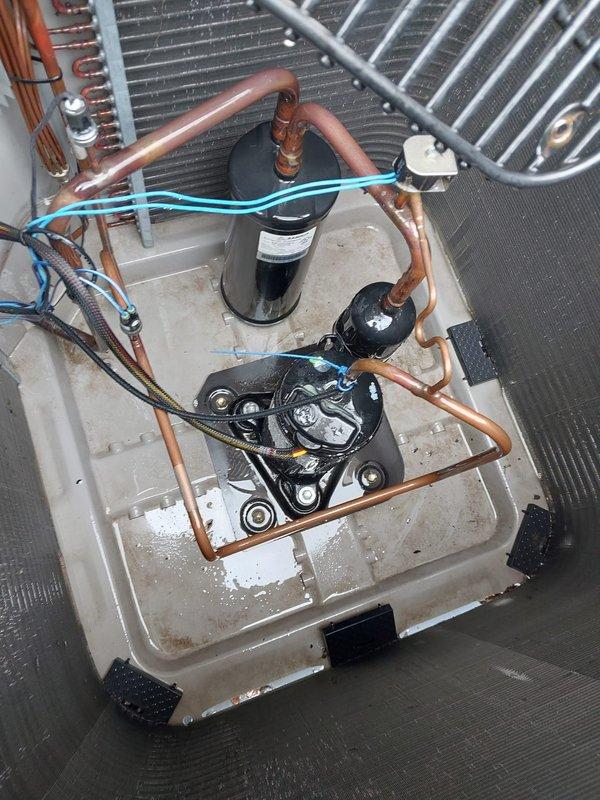 # HVAC Service Completed

Responded to service call for air conditioning system requiring thermistor replacement and complete maintenance service. Upon inspection of the outdoor condensing unit, evaluated the condenser coil assembly and heat exchanger components. The condenser fins and coils were found to be in regular operating condition with protective grille intact.

Accessed internal components including the compressor, accumulator, and refrigerant line assembly. Inspected copper refrigerant lines, condensate drain pan, and associated electrical connections. The drain pan showed normal wear consistent with system age. Performed comprehensive AC maintenance including inspection of all mechanical and electrical components.

Ordered replacement thermistor for system. This service visit serves as a placeholder until the required part arrives. Upon receipt of the thermistor, a follow-up appointment will be scheduled to complete the installation and restore full system functionality. All