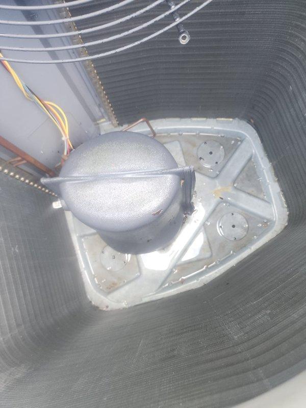 Completed comprehensive cooling season maintenance on residential air conditioning system. Performed detailed inspection of outdoor condenser unit including compressor, capacitor, electrical connections, and condenser coils. All components were evaluated for proper operation, connections were verified secure, and unit was confirmed to be functioning within normal parameters for continued reliable cooling performance.