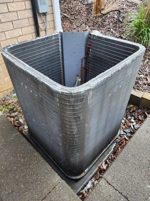 Completed annual preventive maintenance tune-up on residential air conditioning system as part of prepaid worry-free service plan. System was operating properly upon arrival. Performed comprehensive inspection of outdoor condenser unit, including examination of heat exchanger coils, refrigerant lines, electrical connections, and mounting components. Verified proper operation of all system components, checked refrigerant line integrity, and inspected condenser pad and unit placement. All components found to be in good working condition with no immediate service needs identified. System left in normal operating status.
