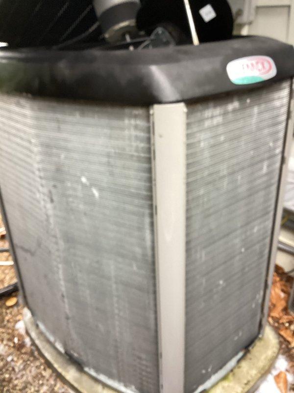 Completed preventive maintenance on three residential air conditioning systems during scheduled morning service call. Performed comprehensive inspections including checking refrigerant levels, testing electrical connections, cleaning condensate drain pans, and verifying proper operation of all units. One outdoor condenser unit observed with protective winter cover still in place, which was documented. Interior system inspection revealed condensate drainage system with standing water in collection pan, indicating normal operation. All three systems tested and confirmed operational with no immediate service needs identified.