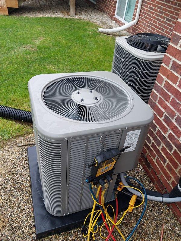 Completed preventive maintenance inspection on two outdoor air conditioning condensing units as part of Worry Free Service Agreement cooling season coverage. Performed standard 3-5 ton system evaluation including refrigerant pressure testing with manifold gauges, electrical connection inspection, and operational assessment of both units. All components found operating within normal parameters with no issues identified requiring immediate attention.