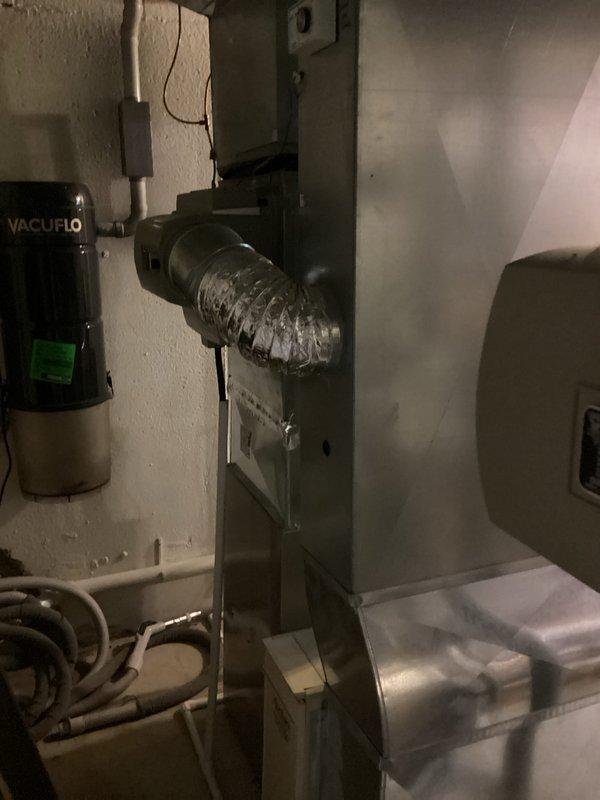 Completed comprehensive estimate for replacement of two HVAC systems in residential property. Evaluated existing Bryant equipment, air handler unit, and associated ductwork including flexible metallic ducting, PVC drainage lines, and ventilation components in mechanical room. Documented current system configuration and provided replacement recommendations for dual-system installation to meet heating and cooling requirements.