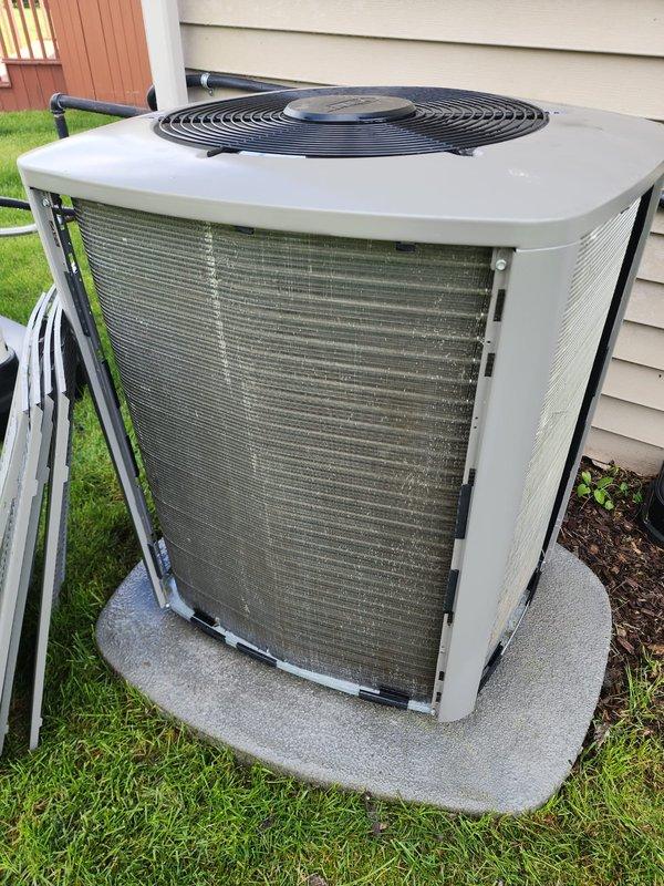 Completed comprehensive cooling system maintenance on residential air conditioning unit. Performed thorough inspection of outdoor condenser unit, including evaluation of cabinet condition, heat exchanger coils, and refrigerant lines. Inspected compressor assembly, electrical connections, and refrigeration components to ensure proper operation and system integrity.