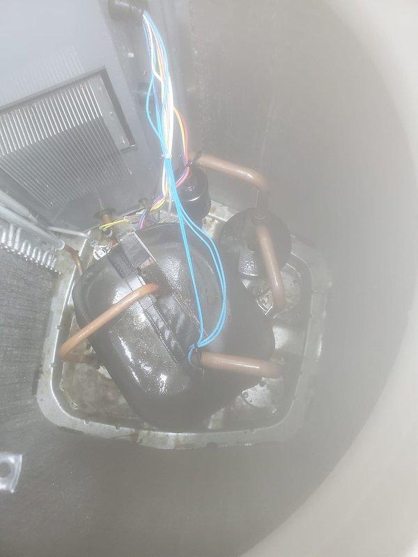 Completed comprehensive cooling system tune-up and maintenance on residential HVAC unit. Inspected indoor air handler components in attic space, including compressor unit, refrigerant lines, and electrical connections; verified proper operation of all wiring and copper tubing. Examined outdoor condenser unit on patio, checked fan operation, cleaned debris and leaves from base area, and confirmed system cooling performance. All components tested and operating within normal parameters; system functioning properly with no issues identified.