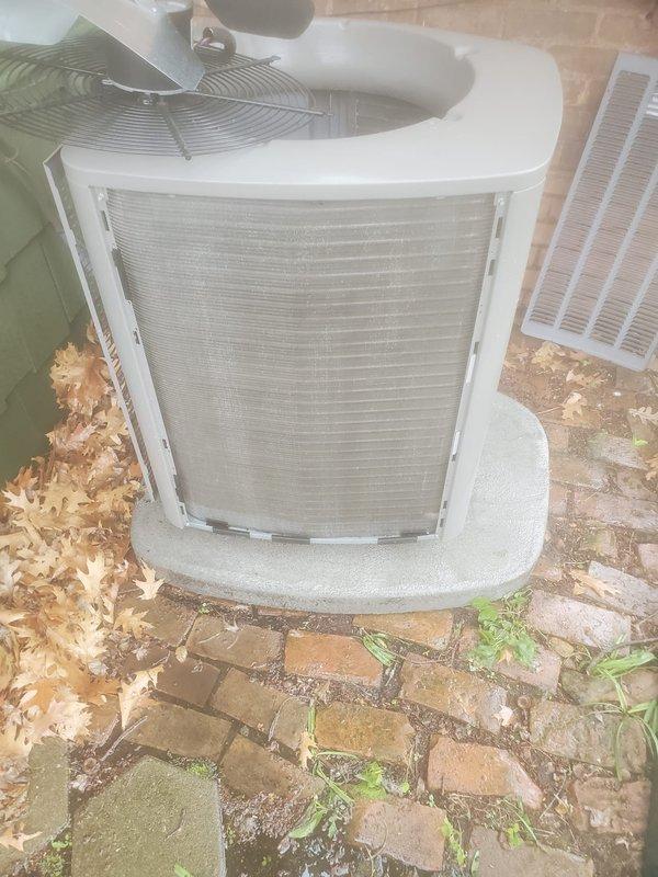 Completed comprehensive cooling system tune-up and maintenance on residential HVAC unit. Inspected indoor air handler components in attic space, including compressor unit, refrigerant lines, and electrical connections; verified proper operation of all wiring and copper tubing. Examined outdoor condenser unit on patio, checked fan operation, cleaned debris and leaves from base area, and confirmed system cooling performance. All components tested and operating within normal parameters; system functioning properly with no issues identified.