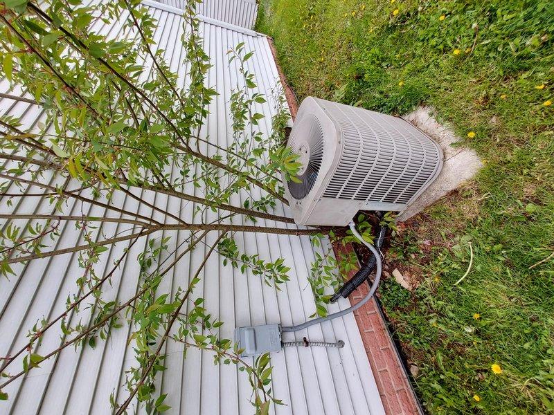 Responded to no cooling complaint on central air conditioning system. Diagnosed failed condenser fan motor preventing outdoor unit operation. Replaced defective motor with genuine OEM Goodman condenser fan motor part #B13400252S. Verified proper system operation and restored cooling capability upon completion.