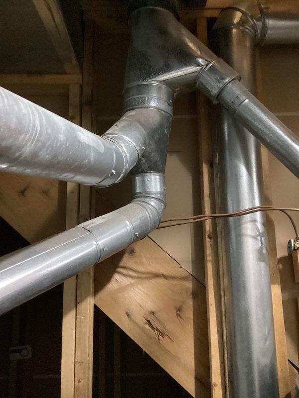 Completed comprehensive HVAC replacement estimate for residential system upgrade. Assessment included existing Bryant furnace installation with associated ductwork configuration, evaluating current metal supply and return duct network, flexible duct connections, and copper refrigerant line routing in mechanical space. Documentation captured equipment specifications, ductwork layout including trunk lines and branch configurations, and overall system accessibility for replacement planning purposes.