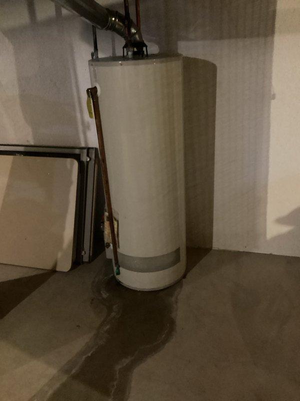 Conducted on-site assessment and provided estimate for residential water heater replacement in basement utility area. Evaluated existing cylindrical tank-style water heater, documenting current installation configuration including copper supply piping, top-mounted connections, and proper venting arrangements. Photographed equipment and surrounding mechanical space to support estimate preparation for complete water heater replacement with new unit of appropriate capacity and specifications.
