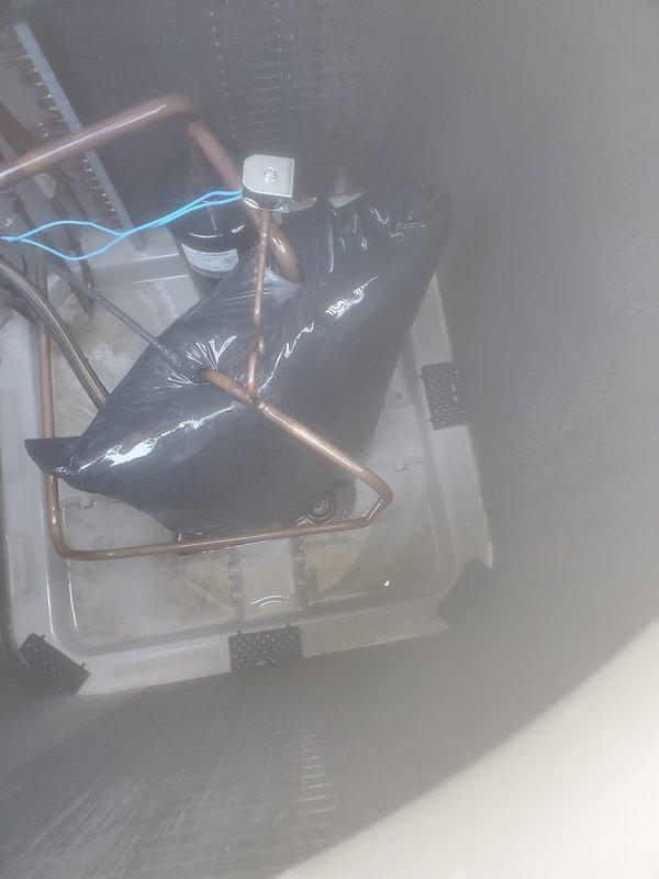 Completed comprehensive cooling system maintenance and tune-up on residential HVAC unit. Inspected outdoor condenser unit, verified proper operation of compressor and fan motor, and checked refrigerant levels. Examined indoor air handler components including evaporator coil and condensate drain system with pump assembly, confirmed all copper refrigerant lines properly secured and insulated. System tested and operating within normal parameters with no issues detected.
