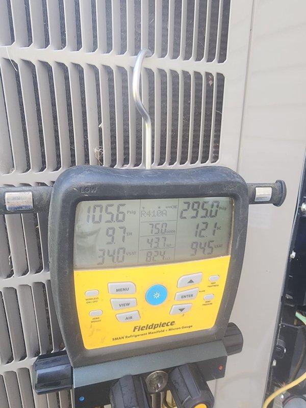 Reconnected air conditioning unit to power supply following concrete pad curing period. Verified system operation with diagnostic measurements and confirmed proper installation on new equipment pad.