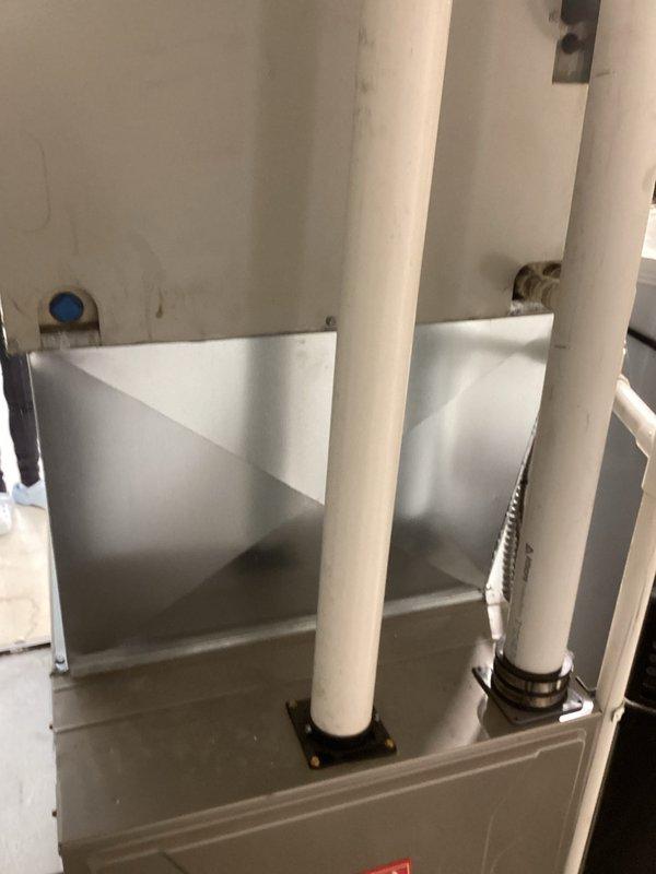 Conducted comprehensive system evaluation for non-operational air conditioning unit and assessed existing Bryant natural gas furnace and natural gas water heater for potential replacement. Documented current equipment conditions including furnace installation with PVC venting system, internal heat exchanger components, and overall mechanical room configuration to provide detailed replacement options and recommendations for full HVAC system upgrade.