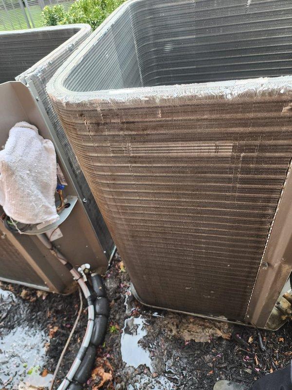 Completed annual tune-up maintenance on 3-year-old residential air conditioning system and furnace. Performed comprehensive inspection of outdoor condenser unit, noting frost accumulation on exterior casing which indicated active cooling cycle during service. Inspected refrigerant lines, copper tubing connections, and insulation integrity at condenser base. Examined indoor air handler components including blower motor assembly, electrical connections, and condensate drainage system. Verified proper operation of all wiring connections (power and control circuits) and confirmed mounting hardware security. Both heating and cooling systems tested and found operating within normal parameters for equipment age.