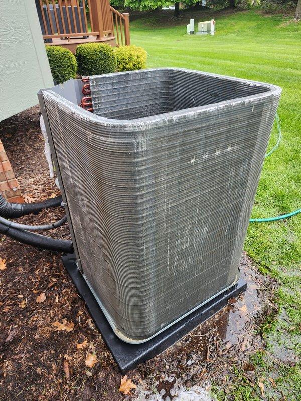 Completed routine AC tune-up on a 2-year-old residential air conditioning system. Performed comprehensive maintenance including inspection of the outdoor condenser unit with clean metal fins showing no signs of wear or damage, verified proper refrigerant line connections, and examined the indoor air handler assembly with organized wiring harness and mounted compressor component. All systems operating within normal parameters with no issues identified or repairs required.