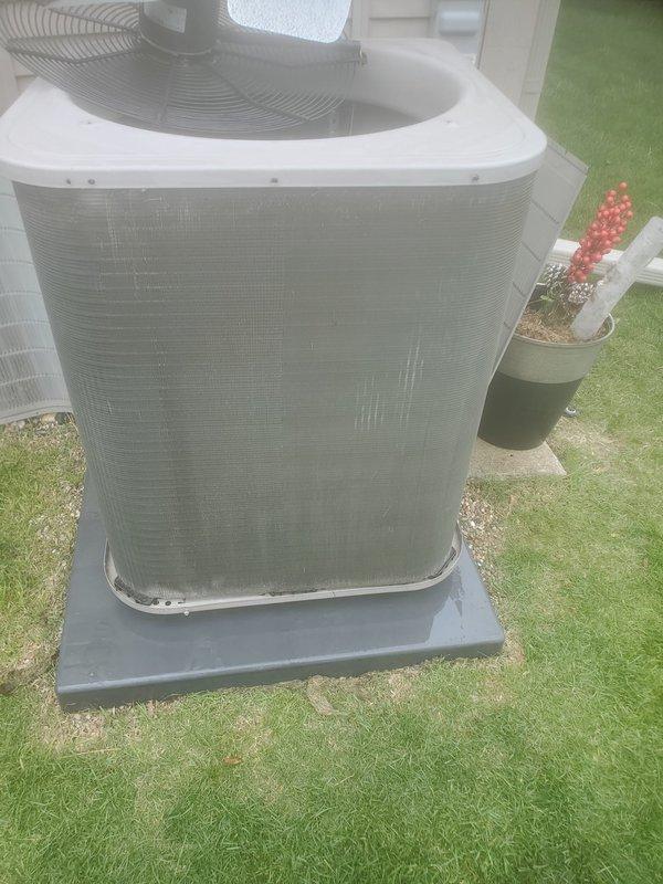 Completed scheduled air conditioning tune-up on five-year-old outdoor condensing unit located at rear of residence. Performed comprehensive system inspection including condenser coil examination, refrigerant line check, electrical connections verification, and condensate drainage system evaluation. Unit operating within normal parameters with proper condensate collection observed in drain pan and trap assembly functioning correctly.