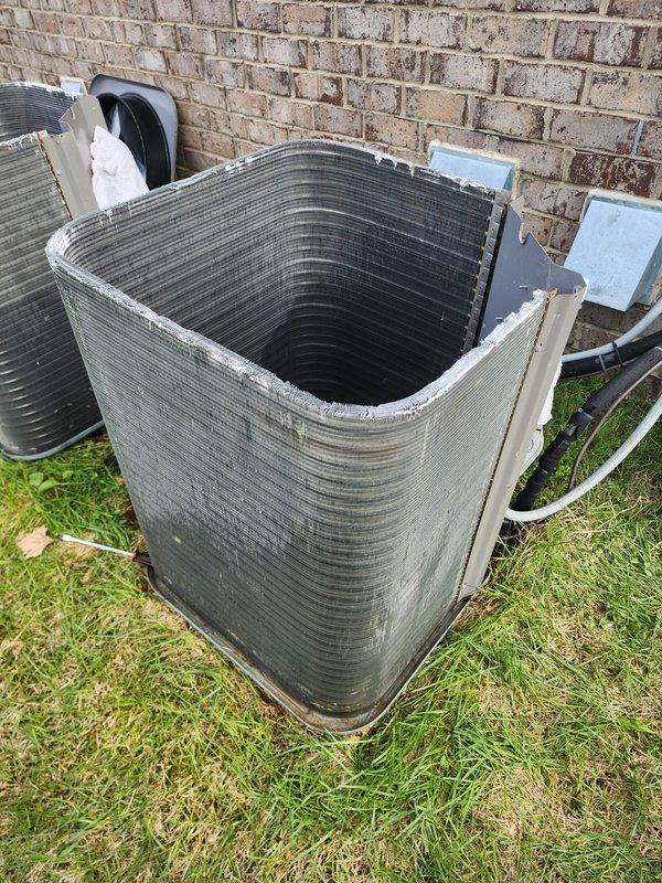 Completed comprehensive cooling system maintenance and tune-up on outdoor air conditioning unit. Removed exterior casing to access and inspect condenser coils, performed thorough cleaning of coil assembly, and verified proper operation of compressor and electrical connections. System tested and confirmed operational with all components functioning within normal parameters.