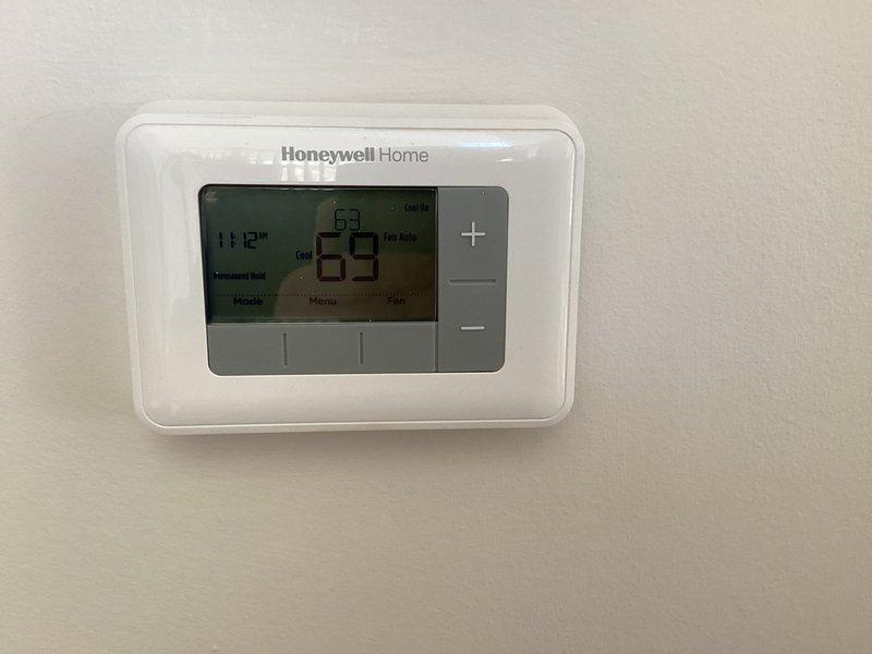 Completed complimentary air conditioner start-up service on Lennox CK30CT-36B-2Y system. Verified unit operation, confirmed Honeywell Home thermostat functionality with proper cooling mode activation, and documented equipment condition with no issues found during inspection.