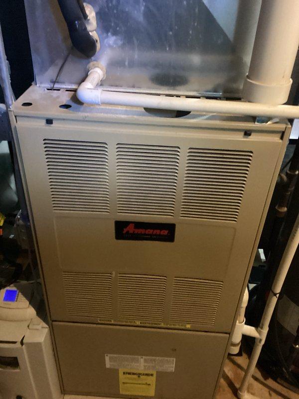 Conducted on-site evaluation and provided electrical estimate for standby generator installation at residential property. Assessed existing 15-year-old HVAC system including Amana furnace and air conditioning unit to determine electrical load requirements and integration considerations for proposed generator system. Documented equipment specifications, photographed current mechanical installations including furnace with PVC condensate lines and air handler unit, and evaluated electrical panel capacity for automatic transfer switch installation. Prepared comprehensive estimate covering generator unit sizing, transfer switch requirements, and necessary electrical connections to support critical home systems during power outages.