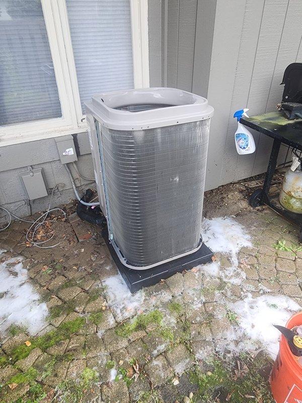 Responded to air and drive error on thermostat and performed requested maintenance service on HVAC system. Inspected outdoor condenser unit and indoor air handler, verified all electrical connections, examined evaporator coil and blower motor assembly, and documented equipment condition with photos. System components found in operational condition with no immediate issues requiring repair at time of service.