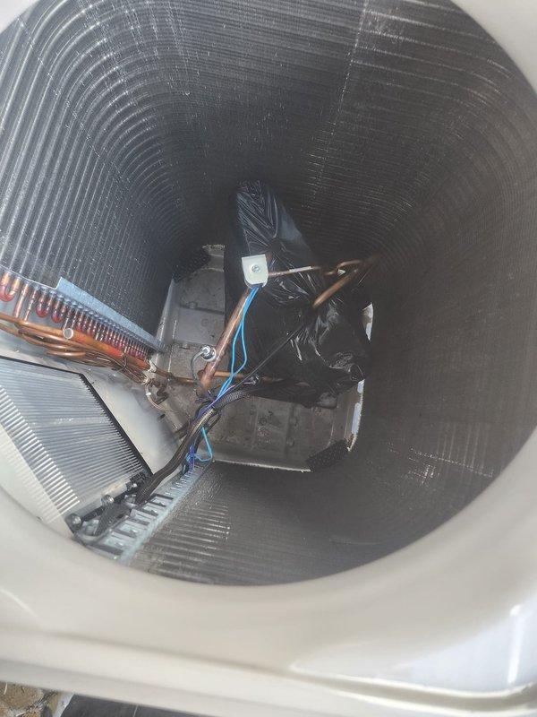 Responded to air and drive error on thermostat and performed requested maintenance service on HVAC system. Inspected outdoor condenser unit and indoor air handler, verified all electrical connections, examined evaporator coil and blower motor assembly, and documented equipment condition with photos. System components found in operational condition with no immediate issues requiring repair at time of service.
