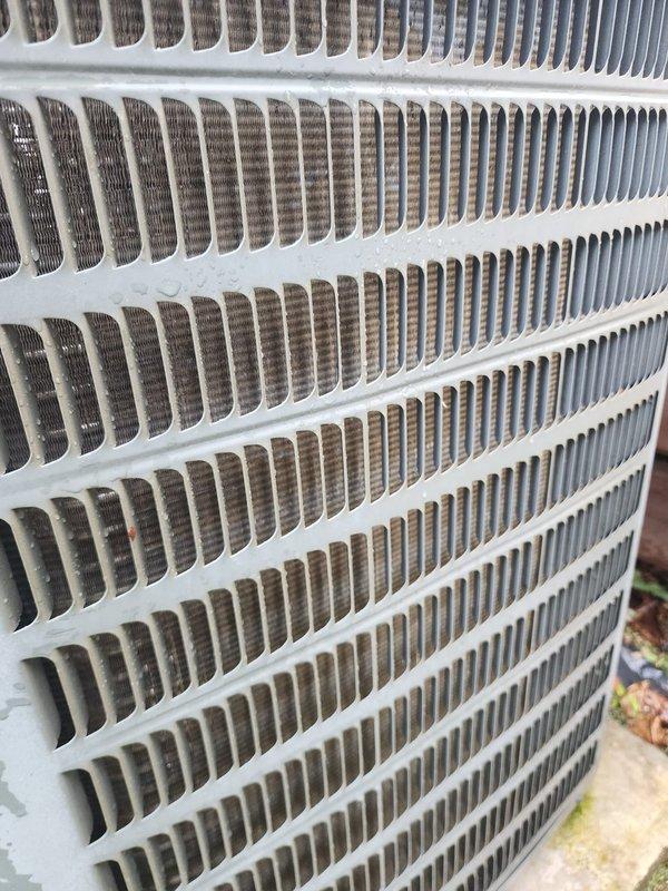 Completed preventative maintenance inspection on cooling system as part of Worry Free Service Agreement. Inspected outdoor condenser unit and documented moderate debris accumulation on coil fins, though structural integrity remains intact, and examined indoor air handler components including blower assembly and mounting hardware, all found to be in serviceable condition.
