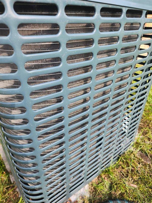 Completed scheduled AC maintenance during the 8-10 AM service window. Performed comprehensive inspection of outdoor condensing unit, including visual assessment of compressor assembly, refrigerant line connections, and condenser coil condition. Compressor showed normal operational wear with minor surface oxidation on mounting plate but remains structurally sound. Condenser coils were clean with adequate airflow through protective grille, and all copper refrigerant lines displayed proper insulation and secure connections with no visible leaks detected.