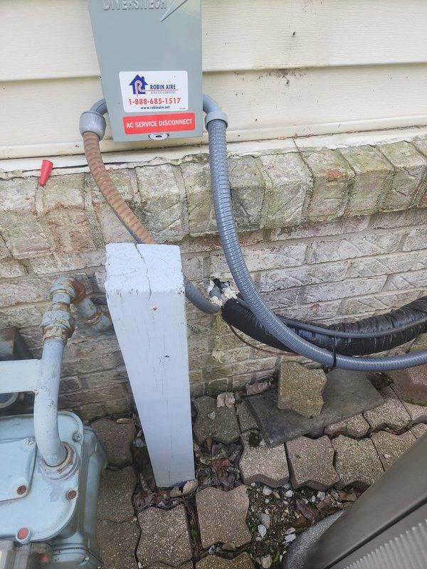 Completed callback service to finish installation detailing on recently installed Lennox HVAC system. Applied weather-resistant caulking around exterior wall penetrations and access points where refrigerant lines and electrical conduits enter the building to ensure proper sealing and weatherproofing. Verified all exterior components including AC disconnect box, line set insulation, and conduit routing were properly secured and protected against the elements.