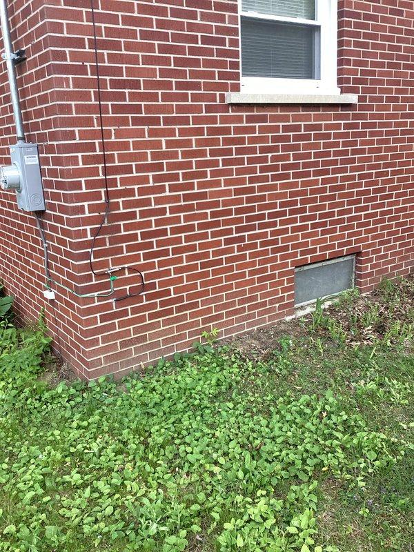 Conducted site assessment for air conditioning system installation at residential property currently equipped with furnace only. Evaluated existing electrical panel capacity and outdoor placement options for condensing unit installation. Documented electrical infrastructure and exterior wall conditions to prepare comprehensive equipment replacement estimate.