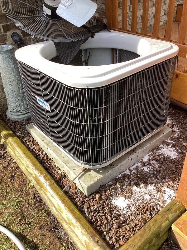 Completed comprehensive preventive maintenance on aging outdoor condensing unit per seasonal tune-up protocol. Performed full system inspection, installed customer-supplied Air Bear filter, verified refrigerant lines and compressor operation, and documented unit condition with photographic evidence. All components found operating within acceptable parameters for equipment age, with minor condensation noted on compressor assembly consistent with normal cooling operation.