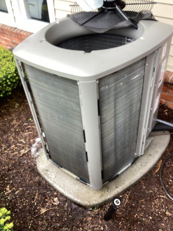 Completed comprehensive preventive maintenance on dual-zone cooling system including both air handler units and outdoor condenser. Performed full tune-up protocol on evaporator coil assembly, inspecting copper refrigerant lines, electrical connections, and capacitor functionality. Cleaned condenser unit, verified proper airflow through vertical slats, inspected fan motor and blade assembly, and confirmed system operation. Both systems tested and confirmed working properly with no deficiencies noted.