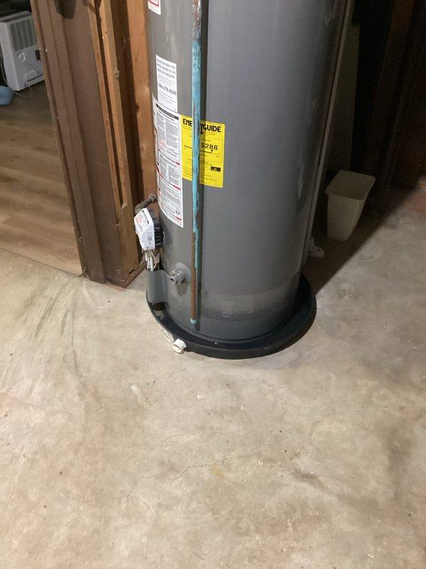 Conducted on-site assessment and provided estimate for 50-gallon water heater replacement serving well water system. Evaluated existing water heater installation in basement utility area, documented current unit specifications, plumbing connections including copper supply lines with shut-off valves, pressure relief valve configuration, and venting arrangement for proper sizing and code compliance requirements.