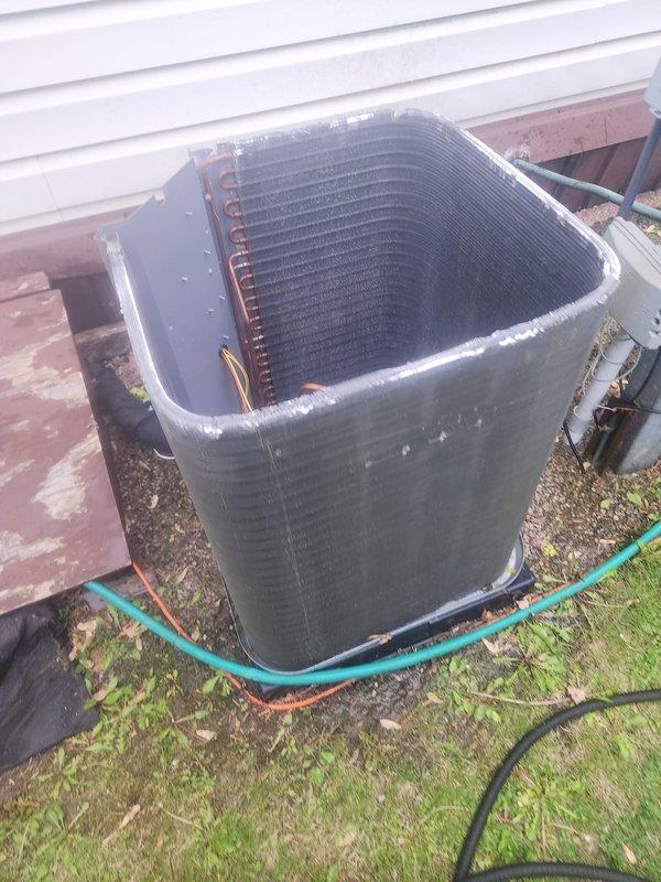 Completed routine AC maintenance on residential split system. Used digital manifold gauges to check system pressures and temperatures, with readings indicating normal operating parameters. Condenser unit exterior showed accumulation of dirt and debris; inspected refrigerant lines, electrical connections, and overall equipment condition as part of standard maintenance protocol.